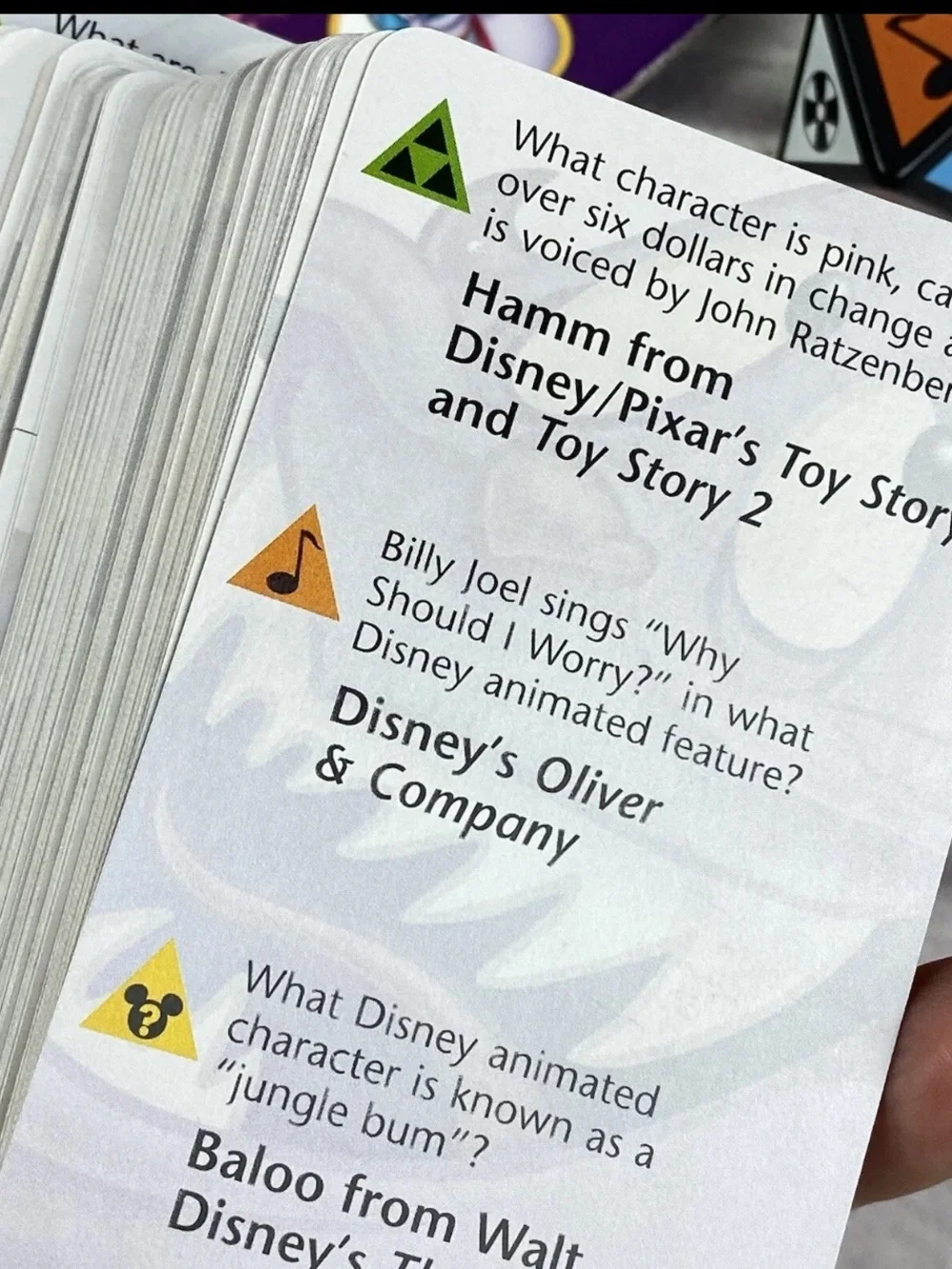 Disney Spin It? DVD Game — Purple and Yellow Box with Colorful Character Art